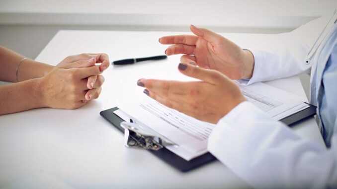 Doctor Talking to a patient. Concept for Cancer Misconceptions